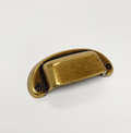 Drawer Cup Pull "Capri" in Antique Brass