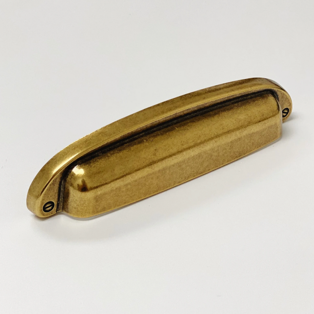 Drawer Cup Pull "Capri" in Antique Brass