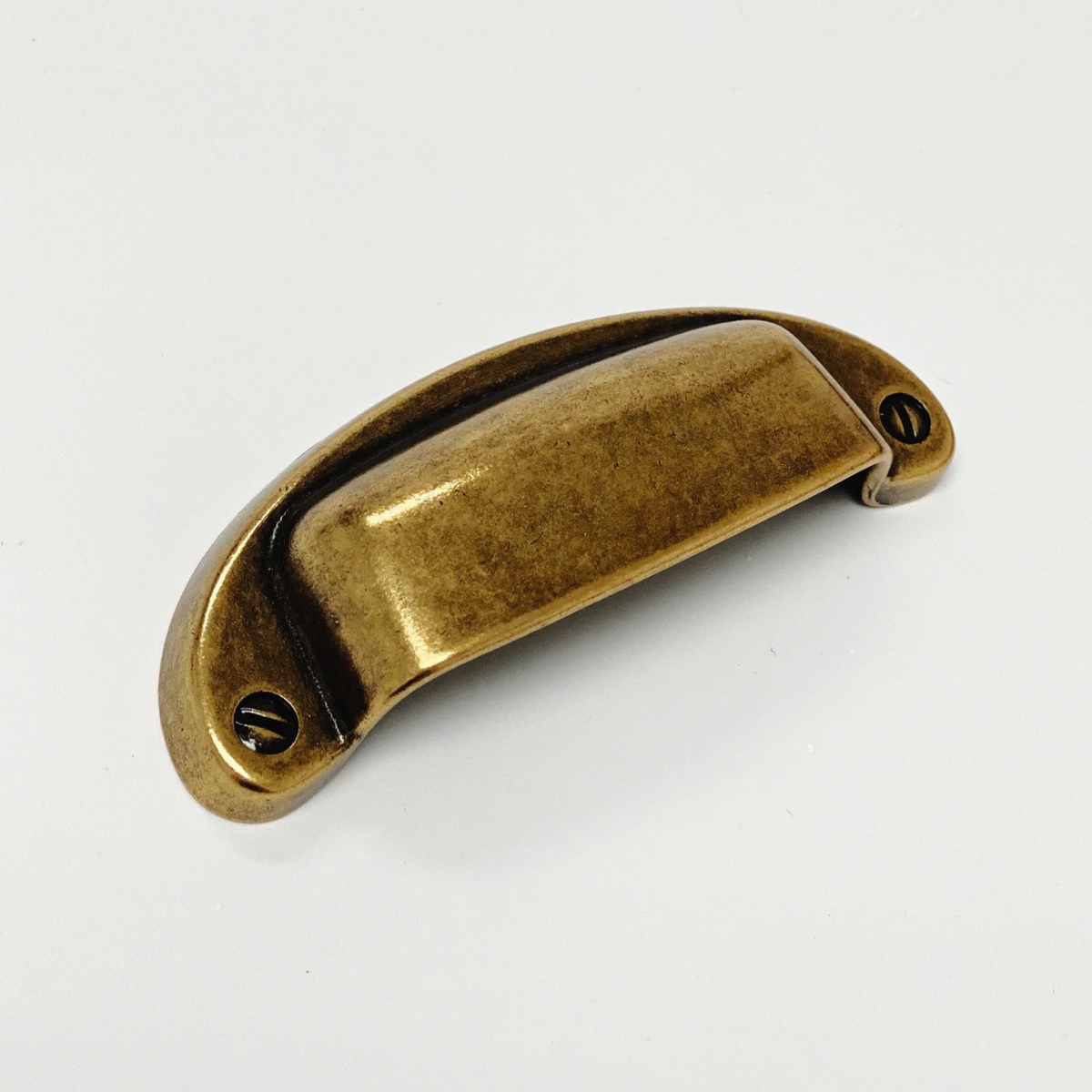 Drawer Cup Pull "Capri" in Antique Brass