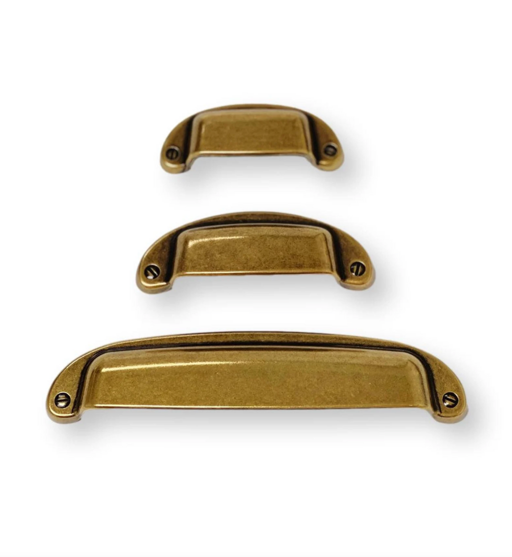 Drawer Cup Pull "Capri" in Antique Brass